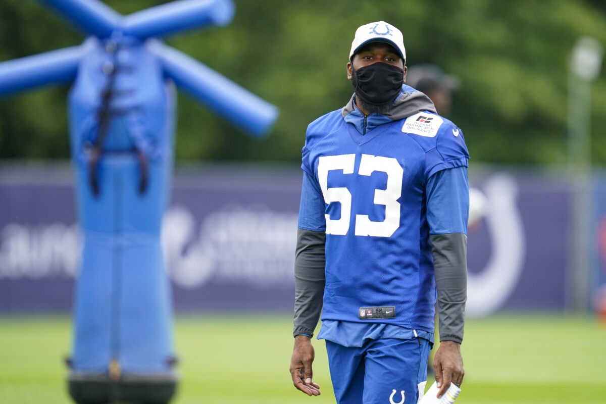 Indianapolis Colts linebacker Darius Leonard on the sideline during practice at the NFL team's football training camp in Westfield, Ind., Saturday, July 31, 2021. (AP Photo/Michael Conroy)