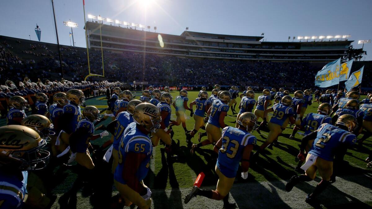 UCLA takes the field for a game against UNLV on Sept. 10 at the Rose Bowl.