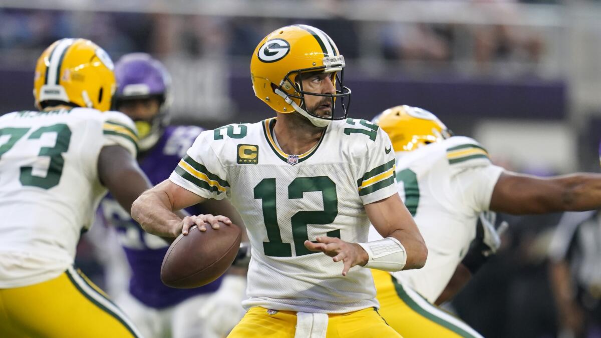 Green Bay Packers quarterback Aaron Rodgers (12) throws a pass during the second half of an NFL football game against the Minnesota Vikings, Sunday, Sept. 11, 2022, in Minneapolis. (AP Photo/Abbie Parr)