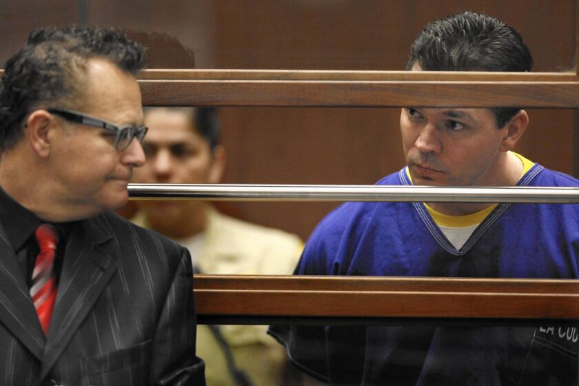 John Lenzie Creech, right, is accused of killing 20th Century Fox executive Gavin Smith in May 2012. Above, he appears with his attorney, Alex Kessel, for his arraignment in Los Angeles County Superior Court in February.