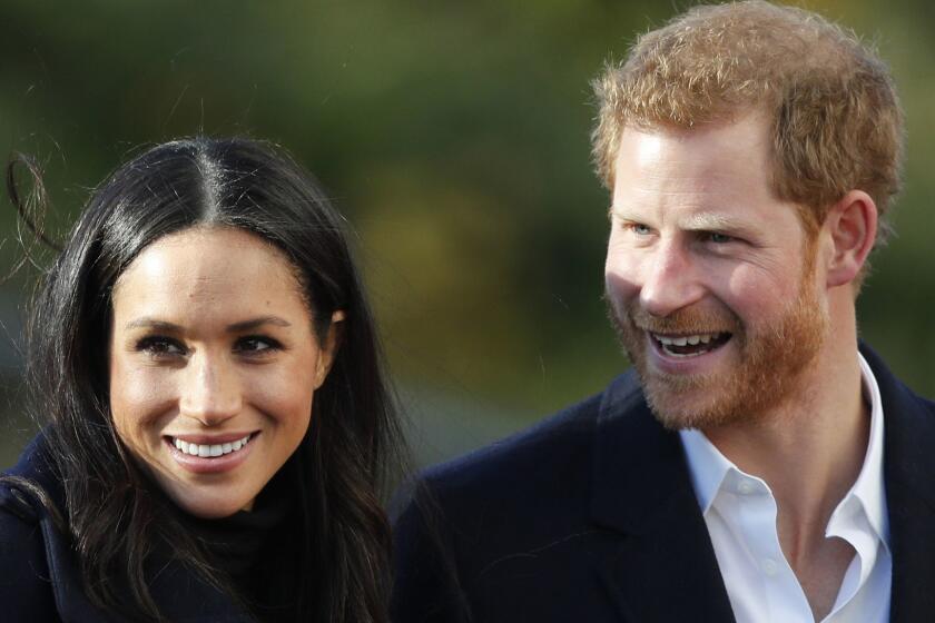 FILE - In this Dec. 1, 2017 file photo, Britain's Prince Harry and his fiancee Meghan Markle arrive at Nottingham Academy in Nottingham, England. Buckingham Palace said Monday May 6, 2019, that Prince Harry's wife Meghan has gone into labor with their first child. (AP Photo/Frank Augstein, File)