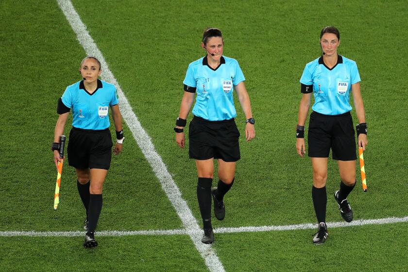 Kate Jacewicz, Kathryn Nesbitt, Felisha Mariscal leave the pitch after the 2019 FIFA Women's World Cup match 