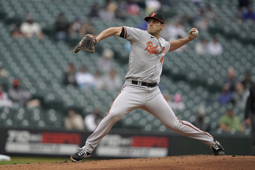 Baltimore Orioles starting pitcher John Means throws against the Seattle Mariners during the third inning of a baseball game, Wednesday, May 5, 2021, in Seattle. (AP Photo/Ted S. Warren)