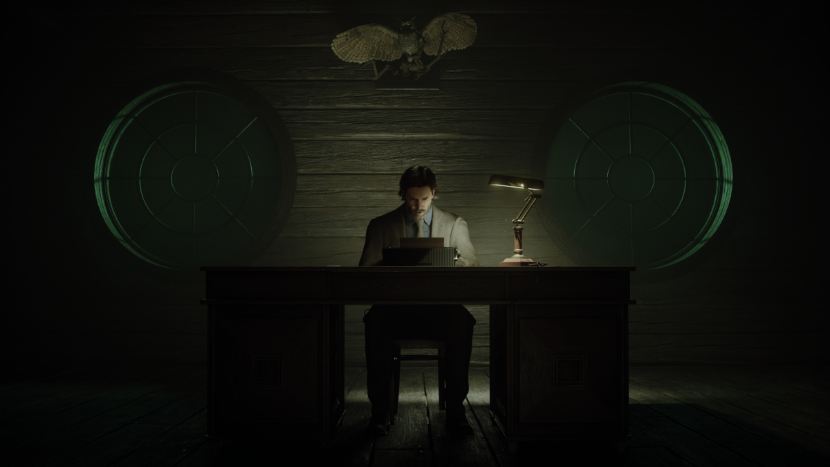 Alan Wake sits a typewriter in "Alan Wake II."