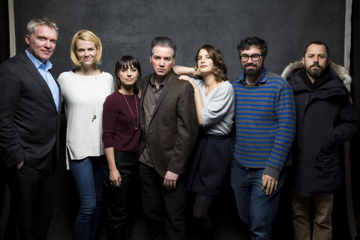 Anthony Michael Hall, left, Brooklyn Decker, Constance Zimmer, Kevin Corrigan, Cobie Smulders, Andrew Bujalski and Giovanni Ribisi with the film "Results," premiering as part of the 2015 Sundance Film Festival.