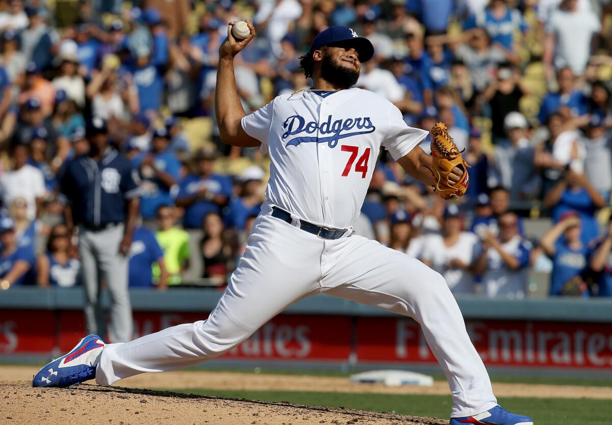 Dodgers closer Kenley Jansen delivers a fastball against the Padres in the ninth inning on Sept. 4.