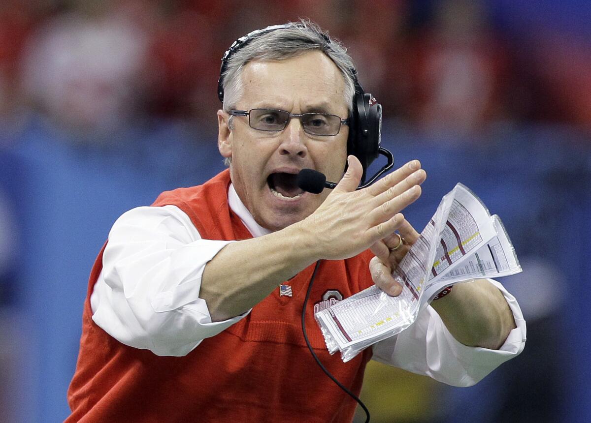 Youngstown State, pending final contract approval, on Friday named Jim Tressel, shown coaching Ohio State in 2011, as its new president.