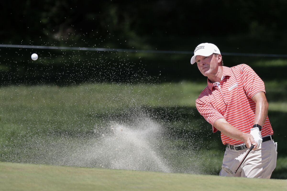 Steve Stricker hits from a bunker to the first green during the third round of the Memorial golf tournament, Saturday, July 18, 2020, in Dublin, Ohio. (AP Photo/Darron Cummings)