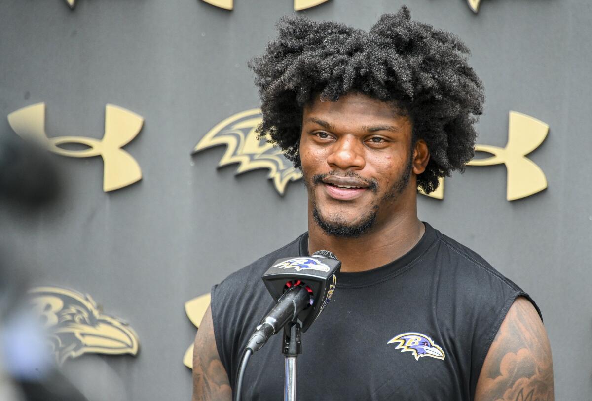Baltimore Ravens' quarterback Lamar Jackson answers questions after practice on Wednesday, Sept. 7, 2022, in Owings Mills, Md. (Kevin Richardson/The Baltimore Sun via AP)