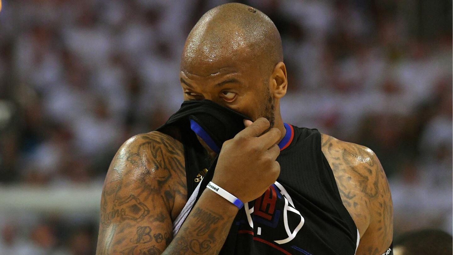 Clippers forward Marreese Speights stares down court during the second half.