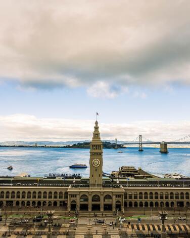 The Ferry Building with the Golden Gate Bridge in the background.