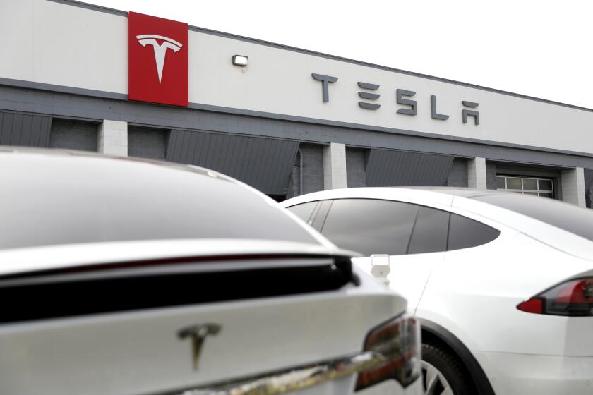 BURBANK, CA - FEBRUARY 16: Tesla Dealership along 811 S San Fernando Blvd, Thursday, Feb. 16, 2023 in Burbank, CA. Tesla, Inc. is recalling 362,758 vehicles in the U.S. because its Full Self-Driving Beta software may cause a crash, according a notice from the National Highway Transportation Safety Administration. (Gary Coronado / Los Angeles Times)