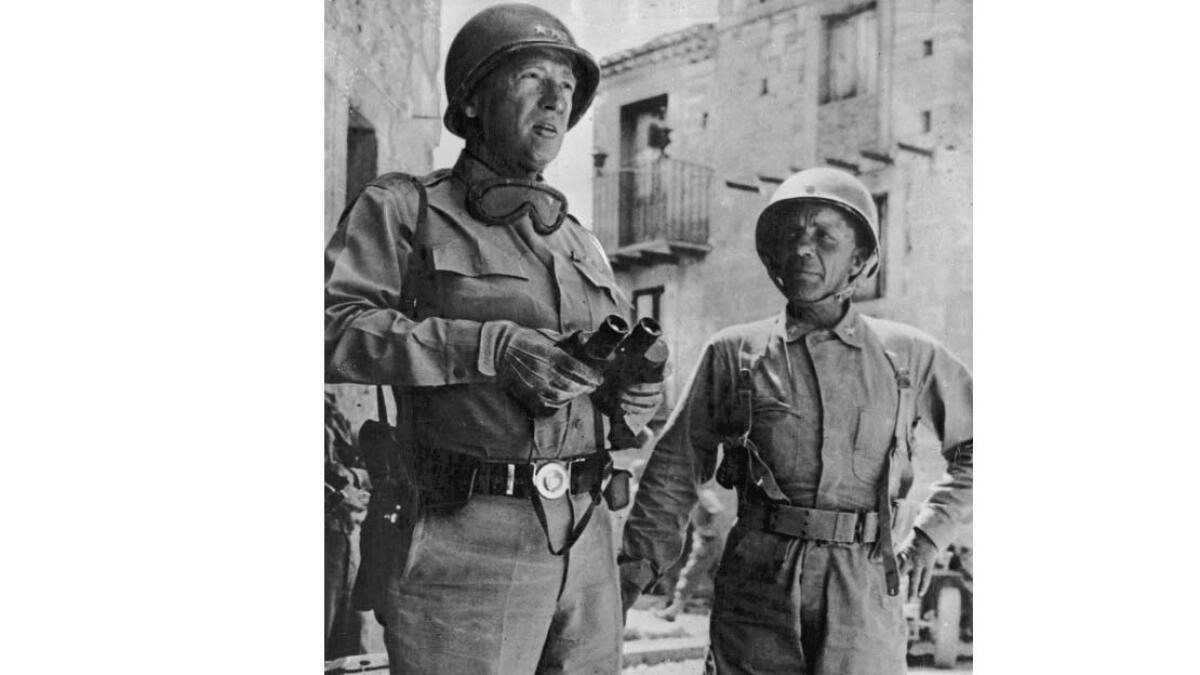 Gen. George Patton, left, with Assistant Commanding Gen. Theodore Roosevelt Jr. in 1943.