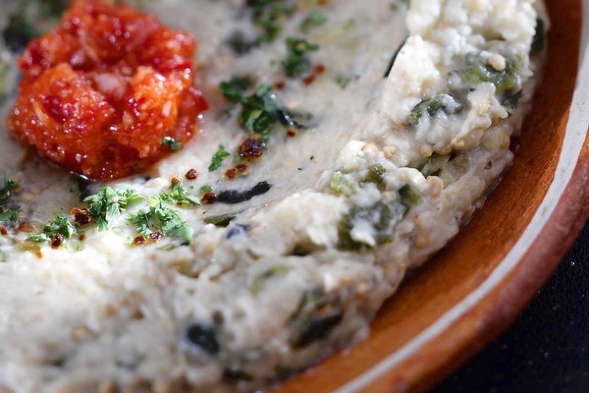 Grilled eggplant dip with tahini, yogurt and roasted chiles.