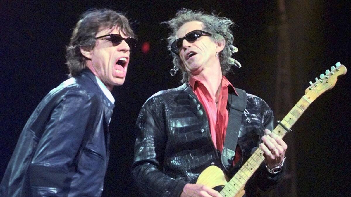Mick Jagger, left, and Keith Richards of the Rolling Stones in Boston in March 1999.