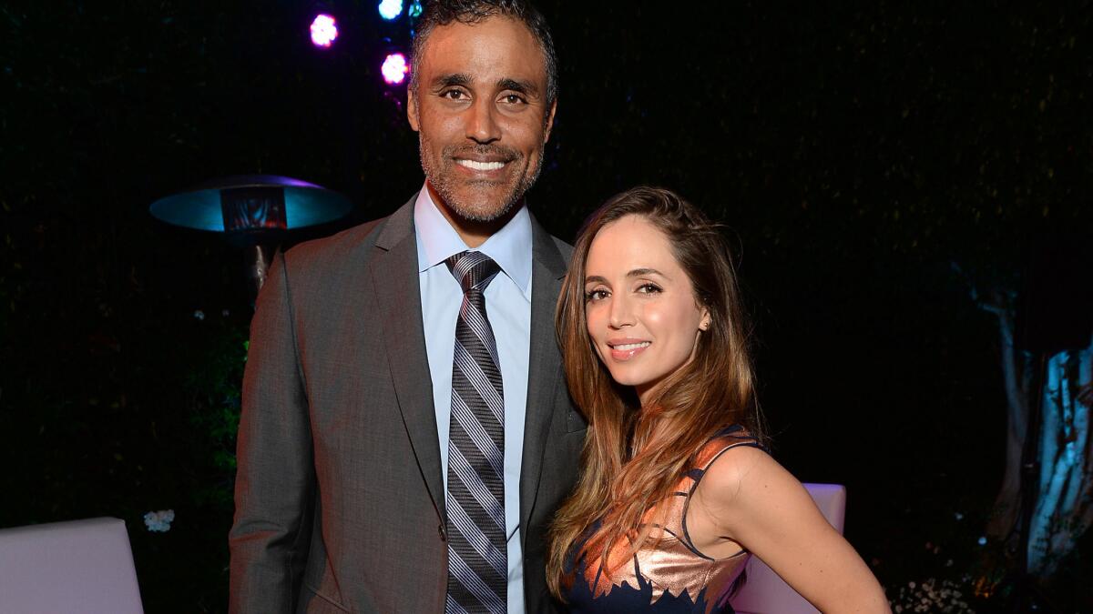 Rick Fox and Eliza Dushku, shown last August, have split after five years together.