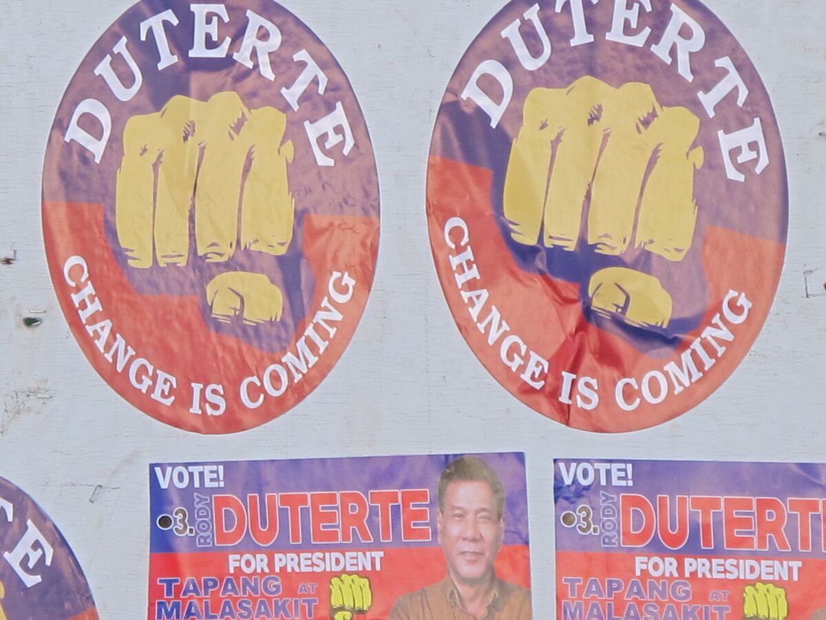 Campaign posters for presidential front-runner Rodrigo Duterte, the famously tough and foul-mouthed city mayor.