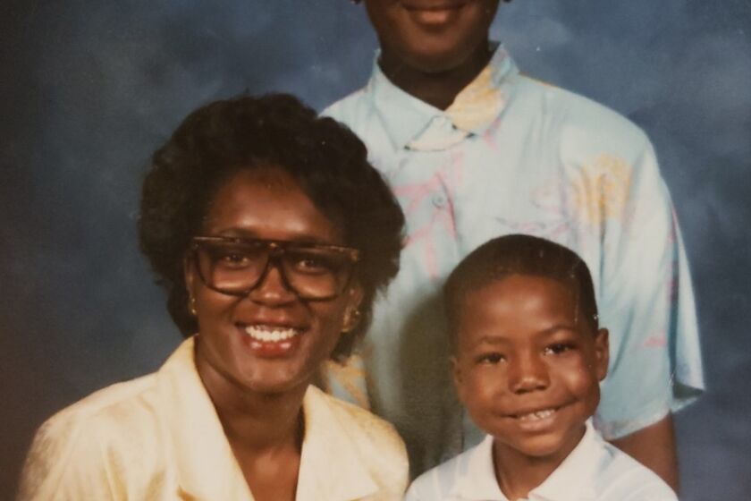 John Browner (then 5) pictured with his mother Margaret and sister Katherine in Chicago, 1985
