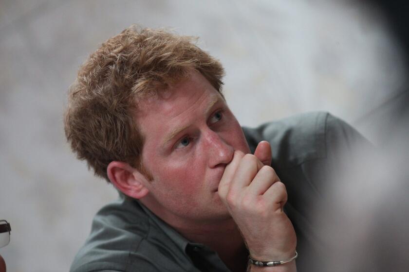 Prince Harry visits the Child in Risk Support Assn. on Wednesday in Diadema, Brazil.
