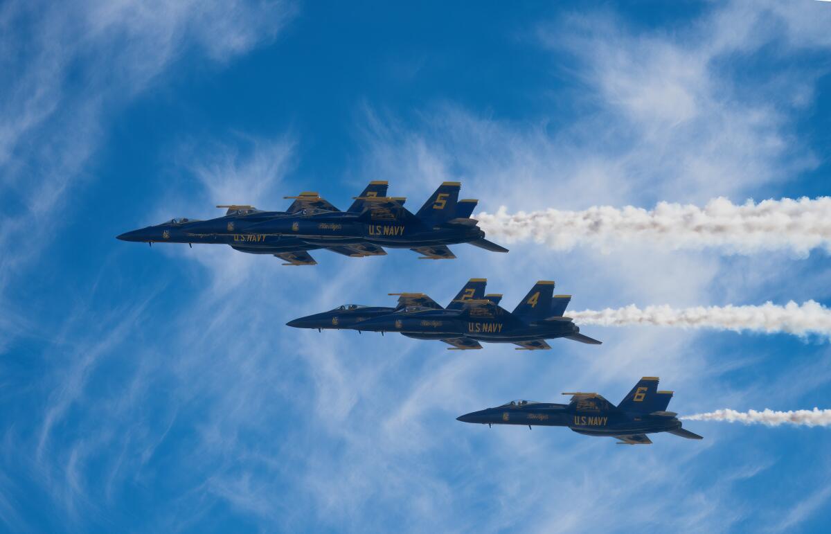 The Navy’s precision Blue Angles flight team fly above the crowd at the MCAS Miramar Air Show on Saturday.