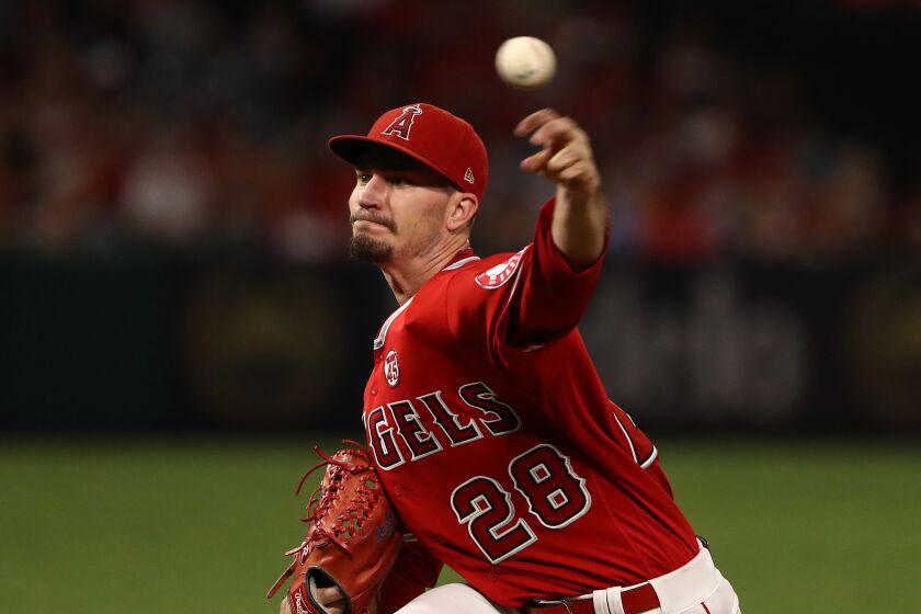 ANAHEIM, CALIFORNIA - SEPTEMBER 13: Pitcher Andrew Heaney #28 of the Los Angeles Angels of Anaheim pitches during the first inning of the MLB game against the Tampa Bay Rays at Angel Stadium of Anaheim on September 13, 2019 in Anaheim, California. (Photo by Victor Decolongon/Getty Images)