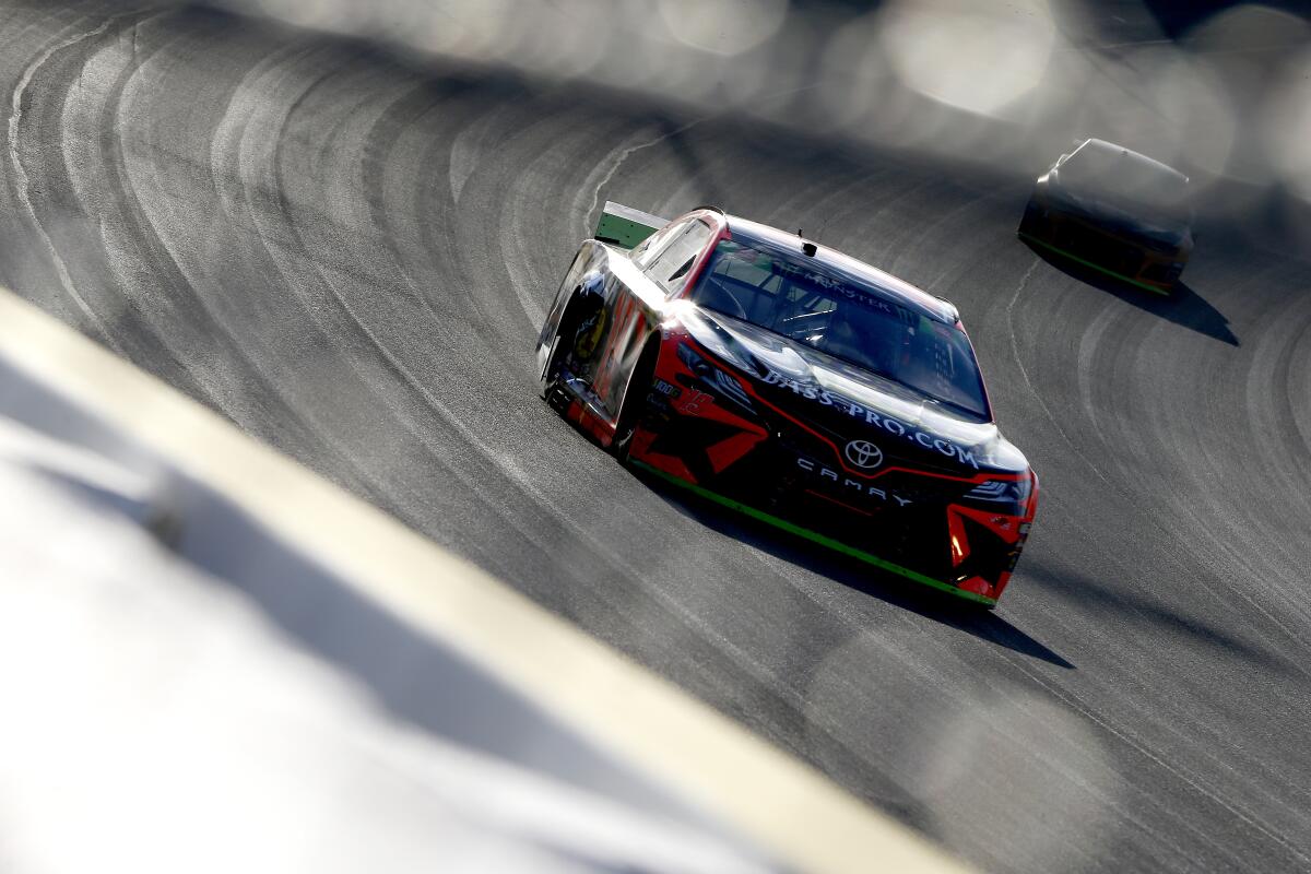 Martin Truex Jr. races at Las Vegas Motor Speedway on Sunday.