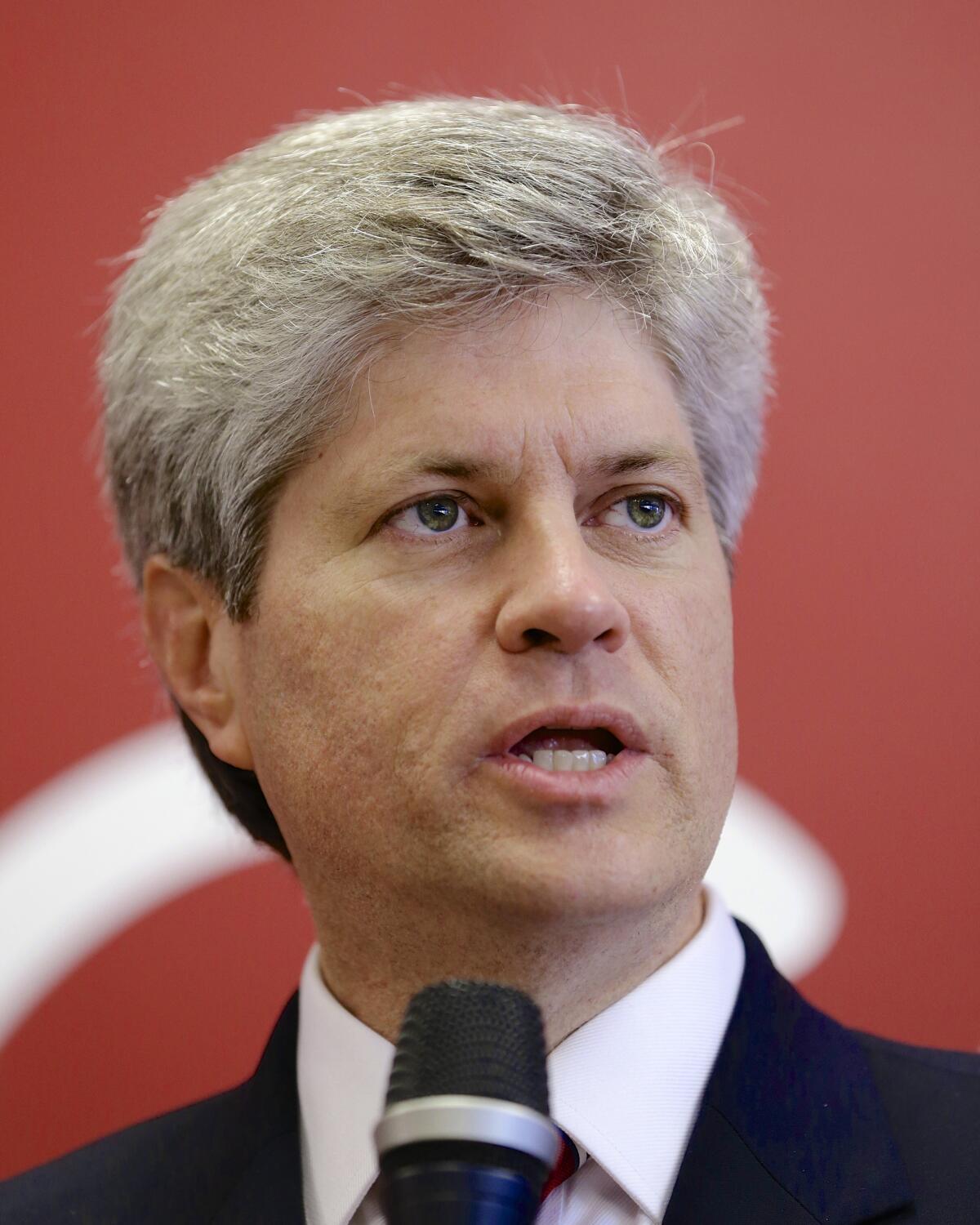 Rep. Jeff Fortenberry speaks into a microphone in a file photo.