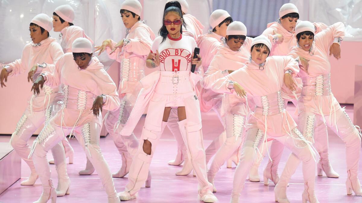 Rihanna, center, wears Hood by Air during a performance at the MTV Video Music Awards at Madison Square Garden on Sunday.