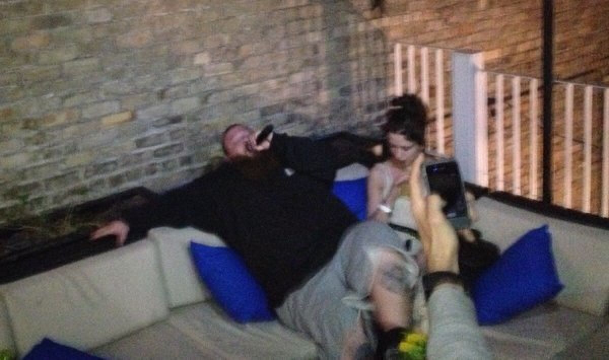 Rapper Action Bronson reclines and raps in the VIP area during a performance at the Belmont on night one of the South by Southwest music festival in Austin, Texas.