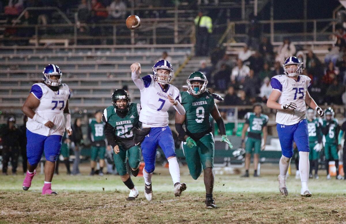 Palisades quarterback Roman La Scala passes against Gardena.