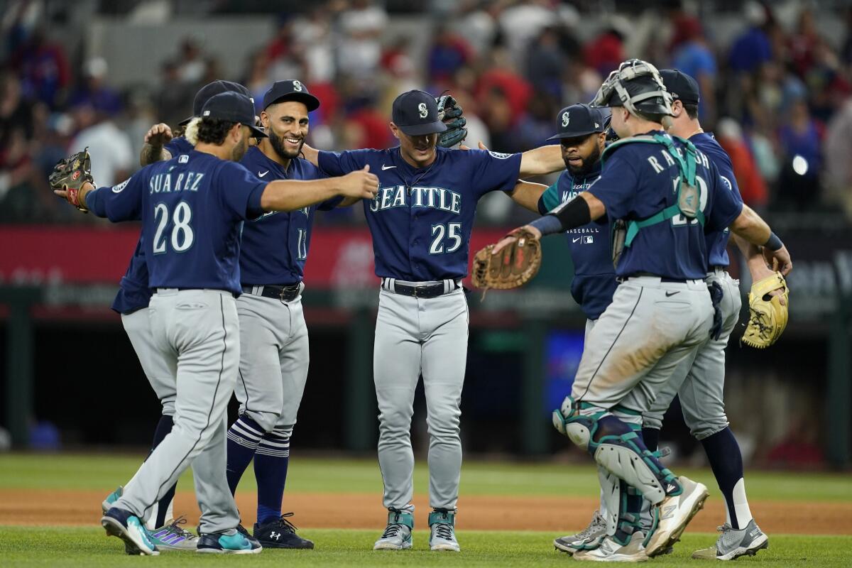 Mariners win 13th in row, top Texas 3-2 in 10 innings - The San Diego  Union-Tribune