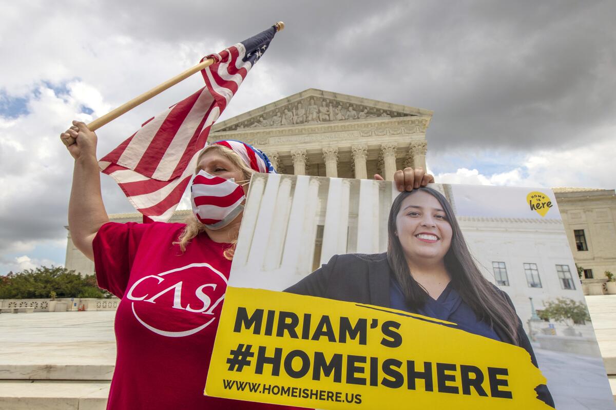 DACA recipients celebrate in front of the U.S. Supreme Court