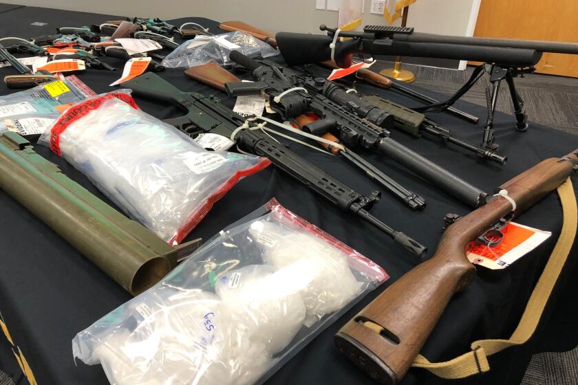 Several firearms and baggies of meth seized as part of a DEA investigation