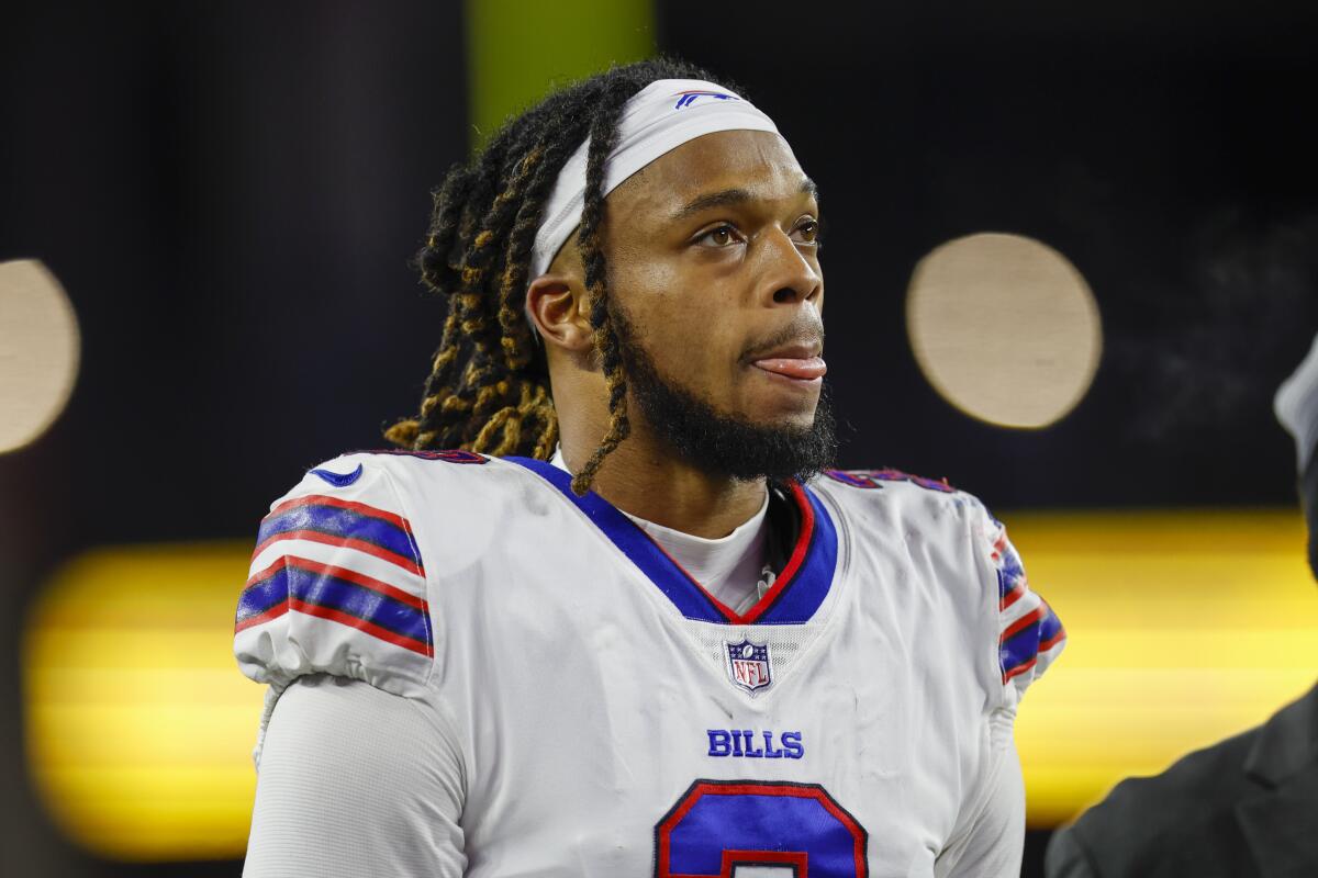 Buffalo Bills safety Damar Hamlin stands on the sideline.