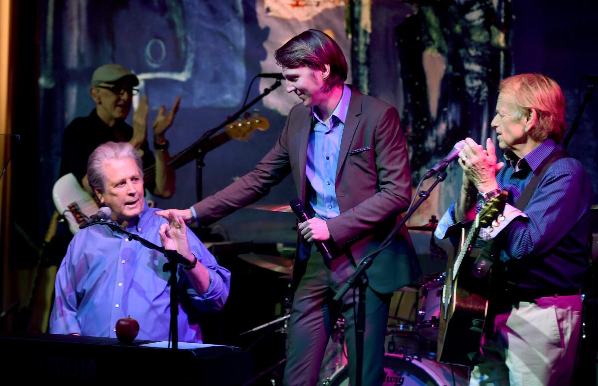 Musician Brian Wilson, left, actor Paul Dano and musician Al Jardine perform at Roadside Attractions' "Love and Mercy" DVD release and music celebration at the Vibrato Jazz Club on Oct. 12.
