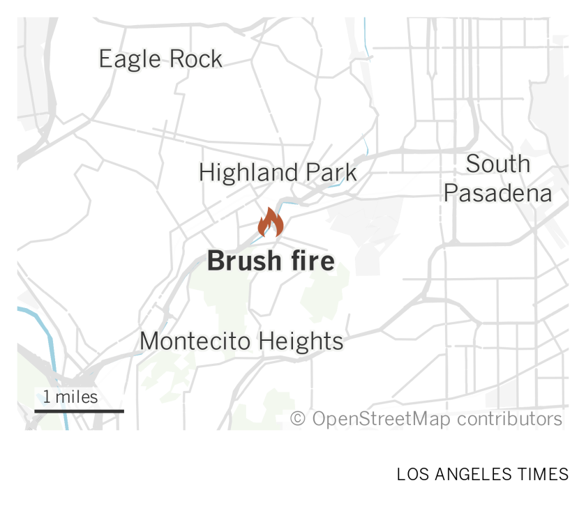 A map of Northeast Los Angeles shows where a brush fire was burning near the 110 freeway in Highland Park