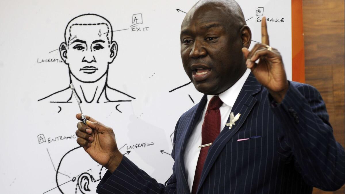 Attorney Ben Crump discusses the results of a forensic examination on Emantic "EJ" Bradford Jr., who was fatally shot by police in a shopping mall on Thanksgiving, during a news conference in Birmingham, Ala., on Monday.