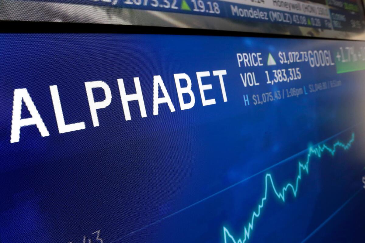 The logo for Alphabet appears on a screen at the Nasdaq MarketSite in New York.