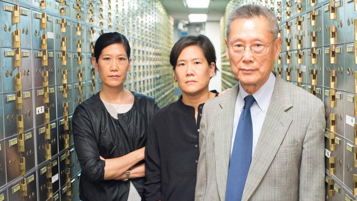 Vera Sung, Jill Sung and Thomas Sung in the documentary "Abacus: Small Enough to Jail."