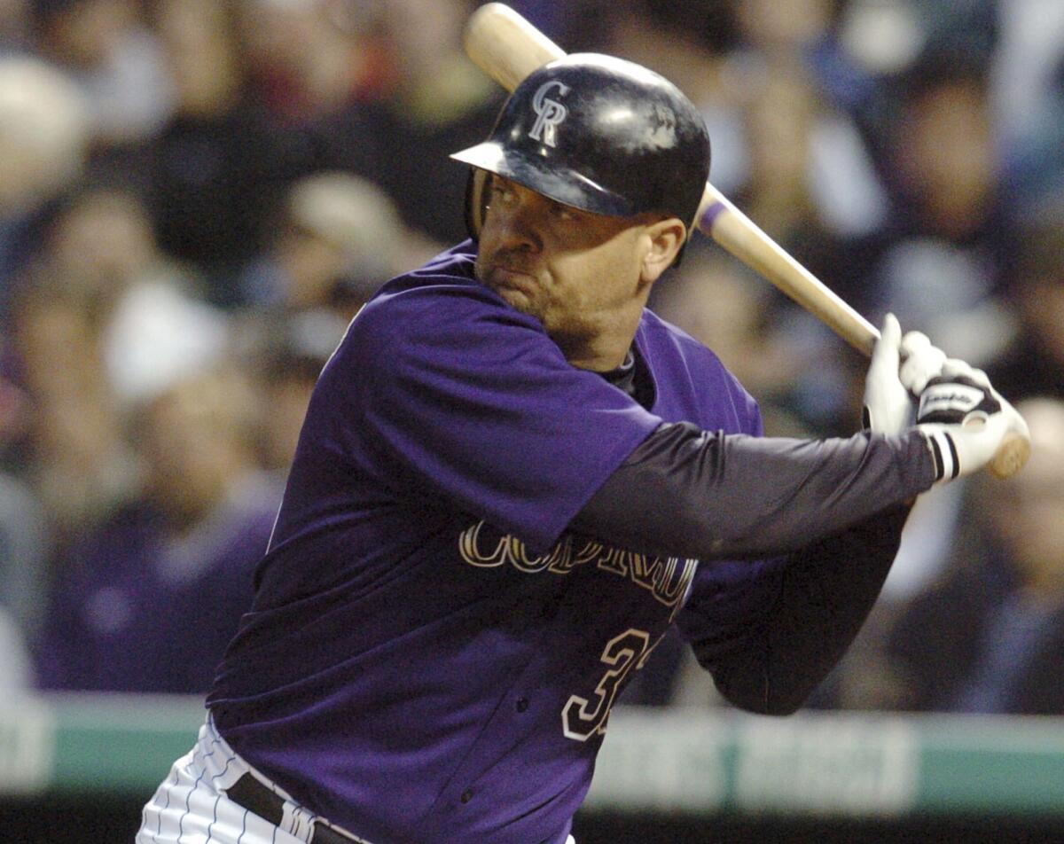 Larry Walker at the plate for the Colorado Rockies in 2004. Walker also earned baseball's highest honor on Tuesday.