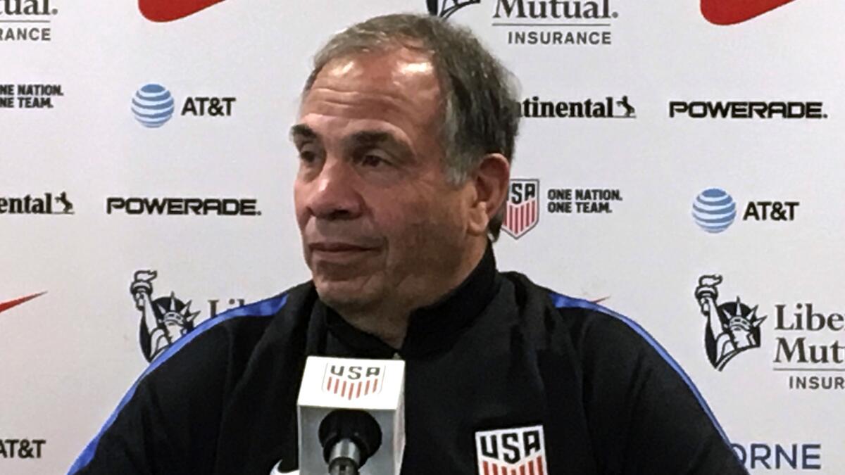 Bruce Arena speaks to the media during a news conference in Orlando, Fla., on Oct. 5.