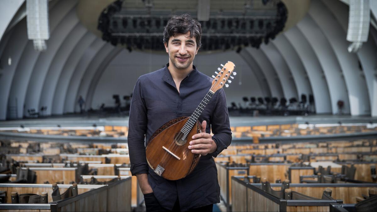 Israeli mandolin virtuoso Avi Avital plays with the Los Angeles Philharmonic on Thursday.