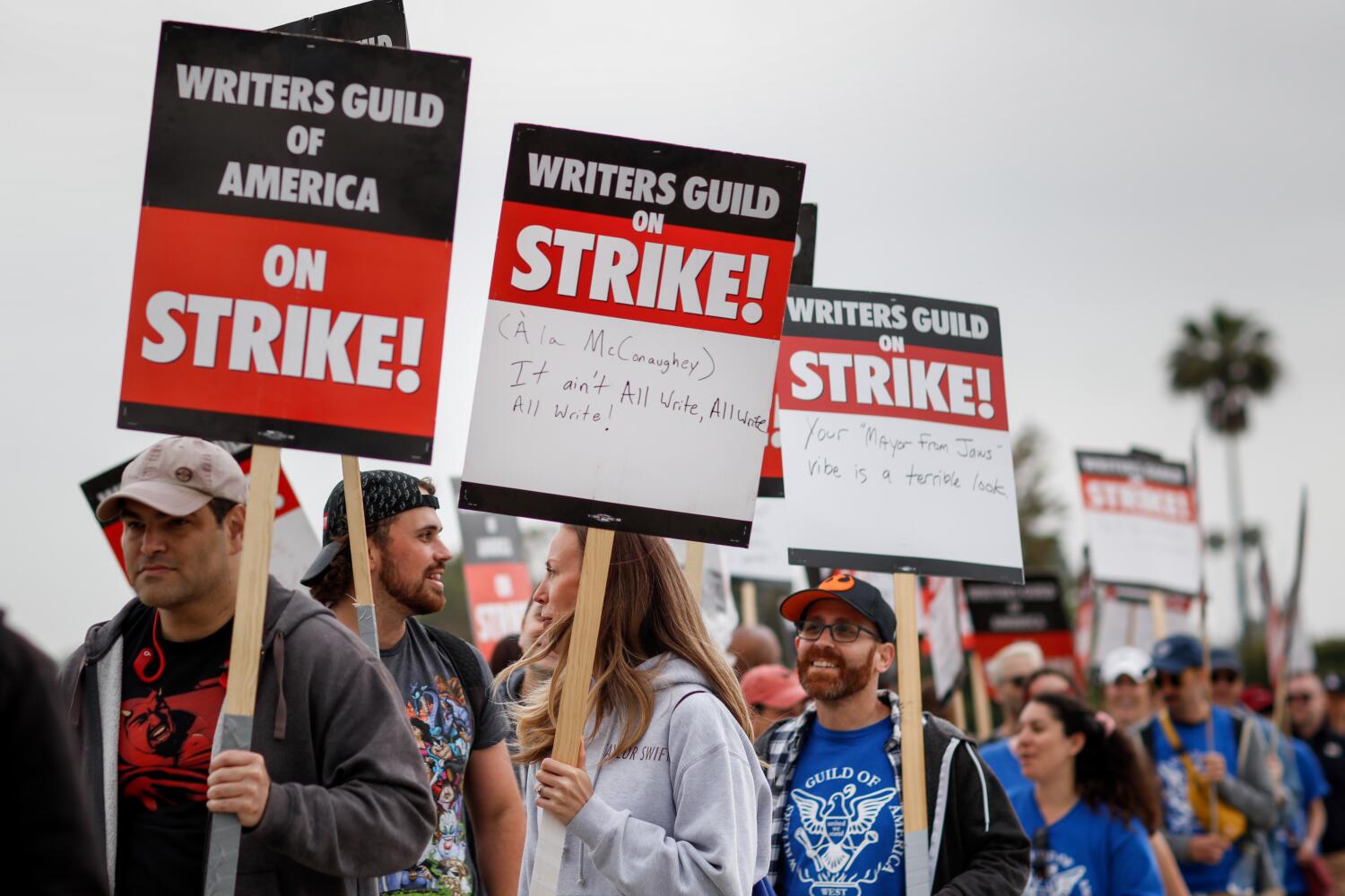 WGA, studios bargain for third straight day with throngs of writers hitting picket lines 