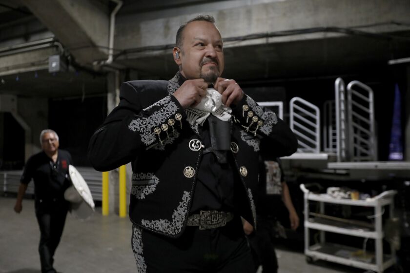 LOS ANGELES, CA JUNE 8, 2019: Pepe Aguilar, ranchera superstar walks backstage as her prepares to perform during the "Jaripeo sin Fronteras Tour 2019 at the Staples Center in Los Angeles, CA June 8, 2019. (Francine Orr/ Los Angeles Times)