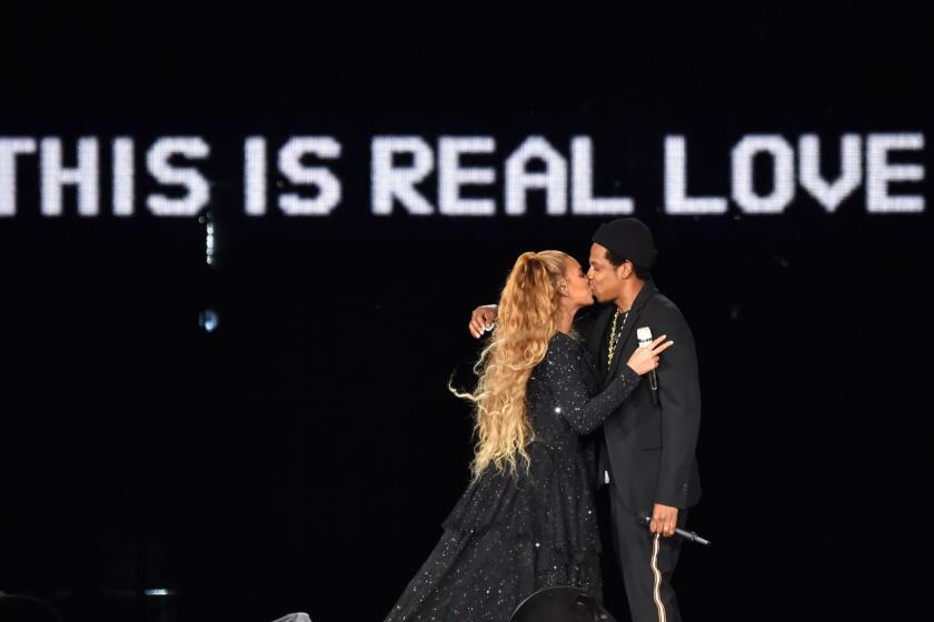 GLASGOW, SCOTLAND - JUNE 09: Beyonce and Jay-Z kiss ending their performance on stage during the "On the Run II" Tour at Hampden Park on June 9, 2018 in Glasgow, Scotland. (Photo by Kevin Mazur/Getty Images For Parkwood Entertainment)