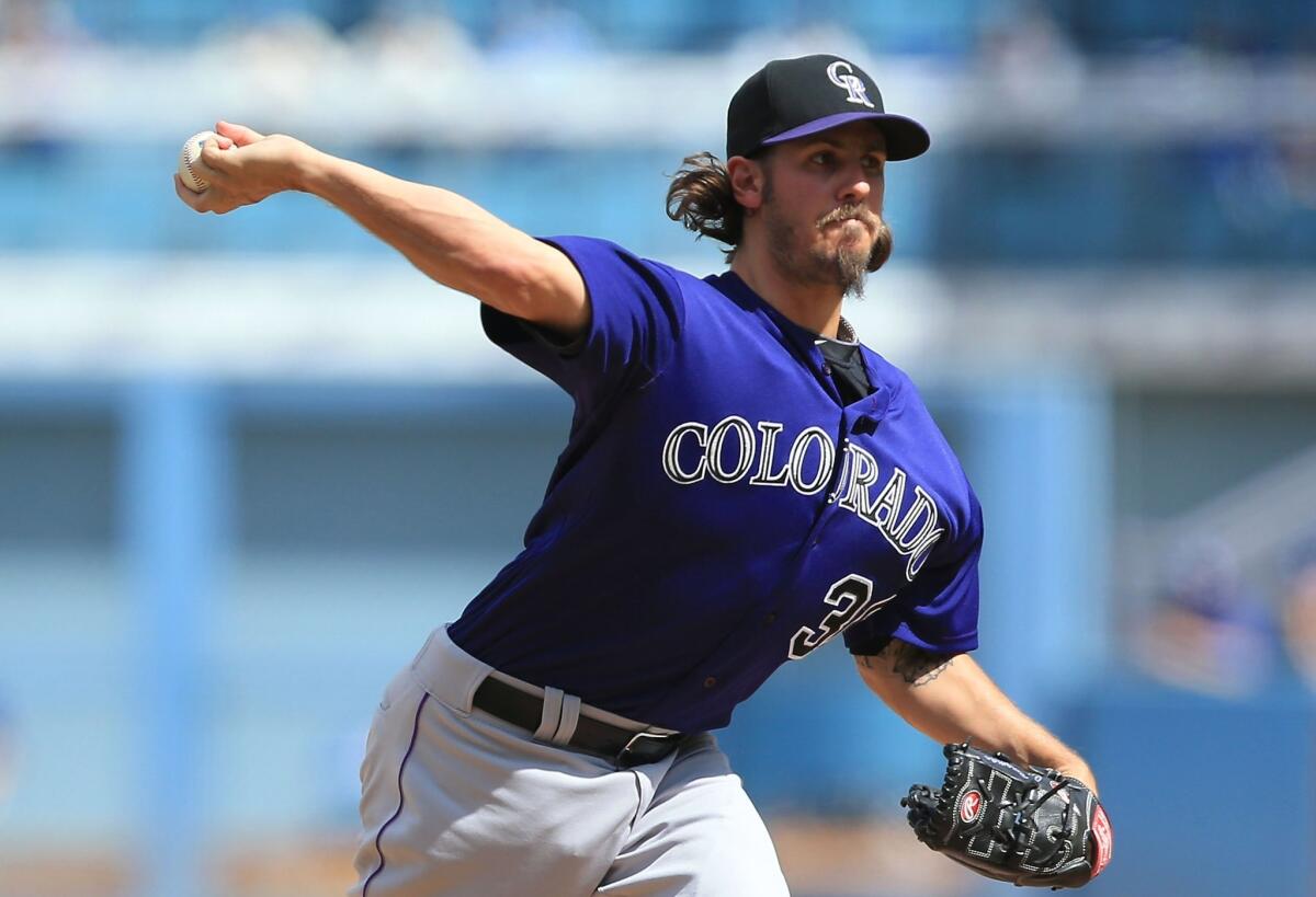 LOS ANGELES, CA - SEPTEMBER 28: Pitcher Christian Bergman #36 of the Colorado Rockies pitches in the first inning during the MLB game against the Los Angeles Dodgers at Dodger Stadium on September 28, 2014 in Los Angeles, California.