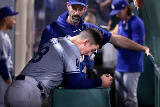 Anaheim, California September 4, 2024-Dodgers pitcher Bobby Miller gave up seven runs to the Angels at Anaheim Stadium Wednesday. (Wally Skalij/Los Angeles Times)