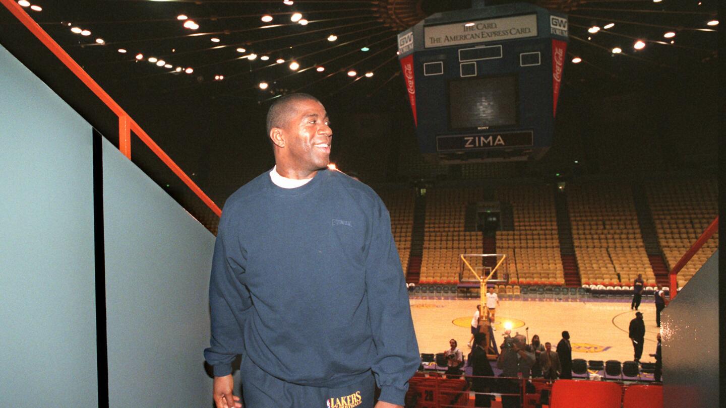 Magic Johnson looks over his shoulder after his last practice at the Forum on Jan. 30, 1996 before his first comeback game for the Lakers.
