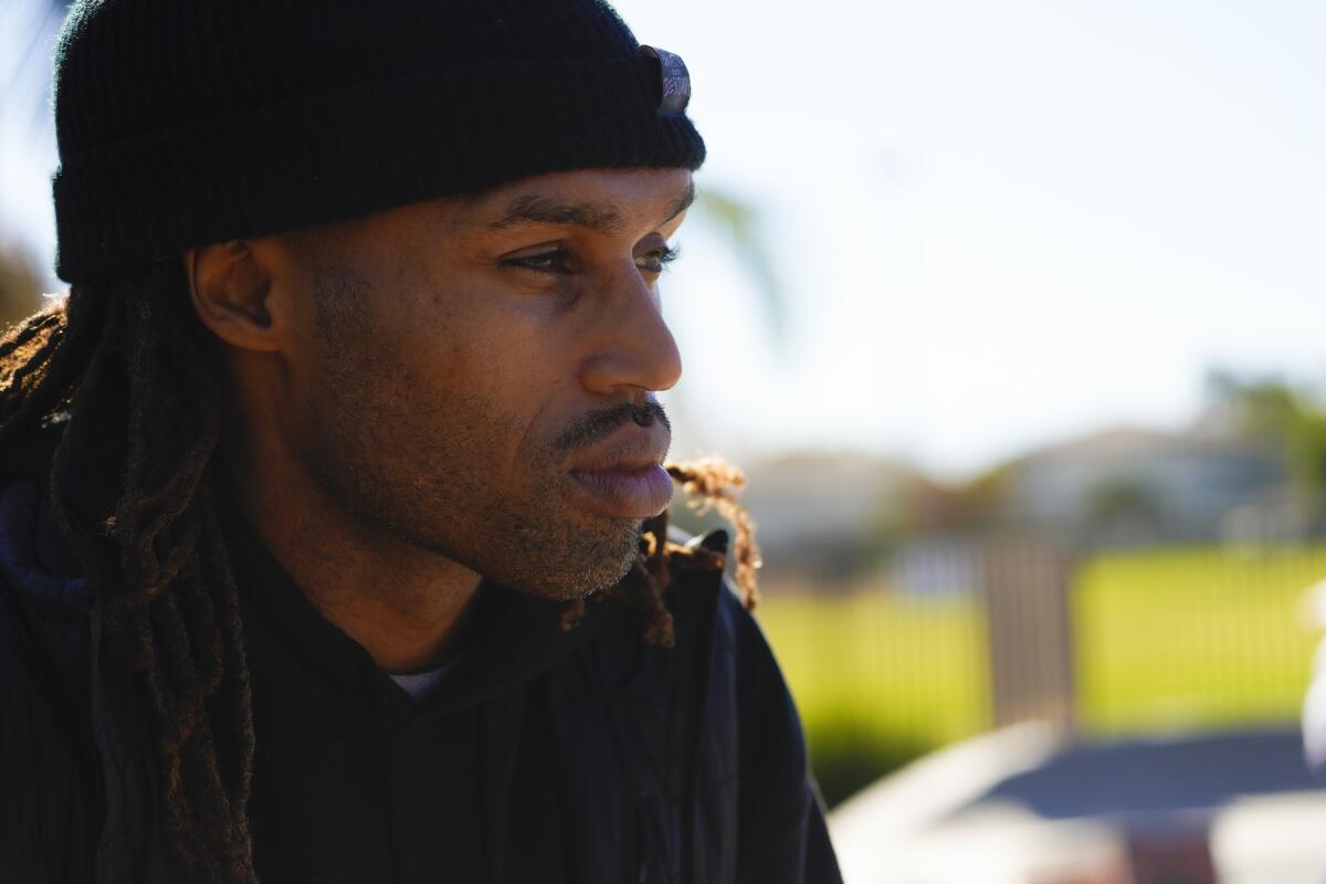 Brandon Turner, 39, pauses after warming up doing a few skate tricks at Linda Vista Skate Park on Dec. 15.