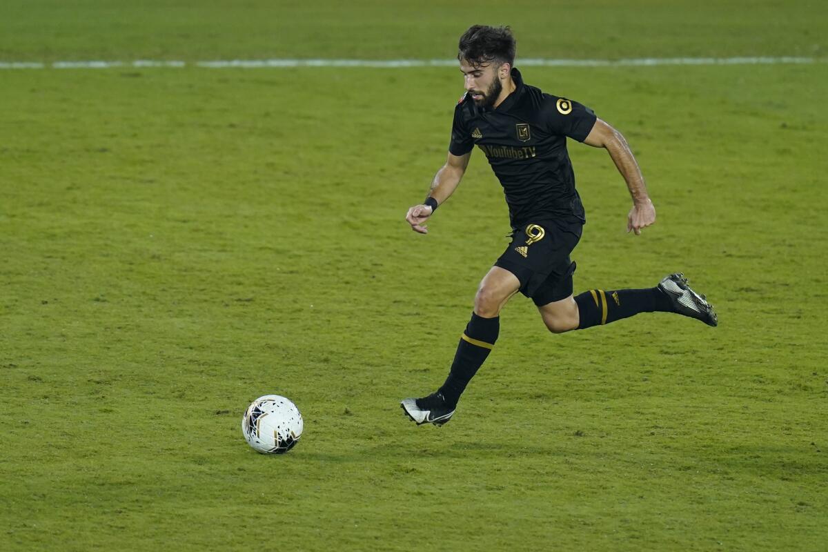 LAFC forward Diego Rossi controls the ball during a CONCACAF Champions League match Dec. 20, 2020, in Orlando, Fla.